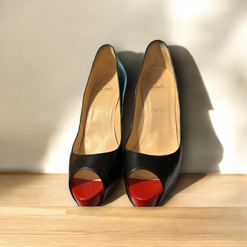 Black Christian Louboutin peep toe heels